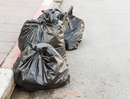 Household furniture items ready for removal in Queenspark