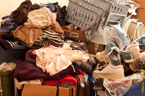 Team preparing for loft clearance in a Queenspark home