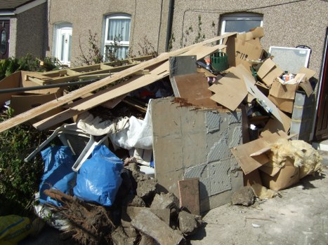 Sorted household items prepared for responsible clearance in Queenspark