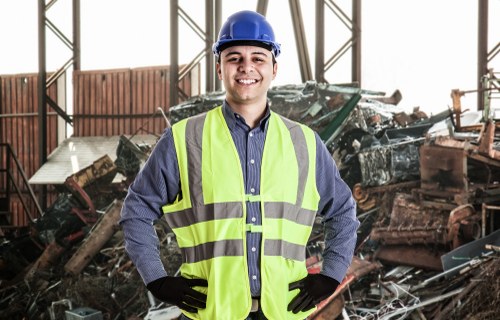 Sorted business waste bins and recyclable materials in Queenspark